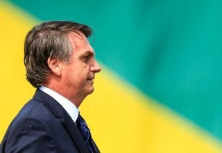 Bolsonaro ataca jornalista ao ser questionado sobre os casos de Flávio e Queiroz